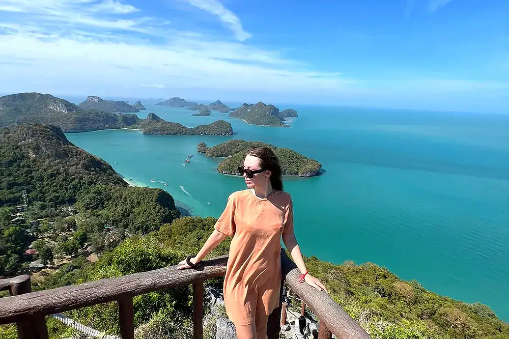 Traveller at the viewpoint above turquoise bays