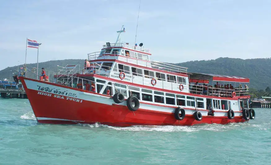 Big red tourist boat on the way to Ang Thong