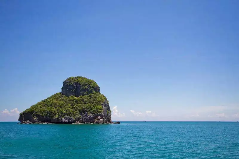 Small round limestone island in the open sea