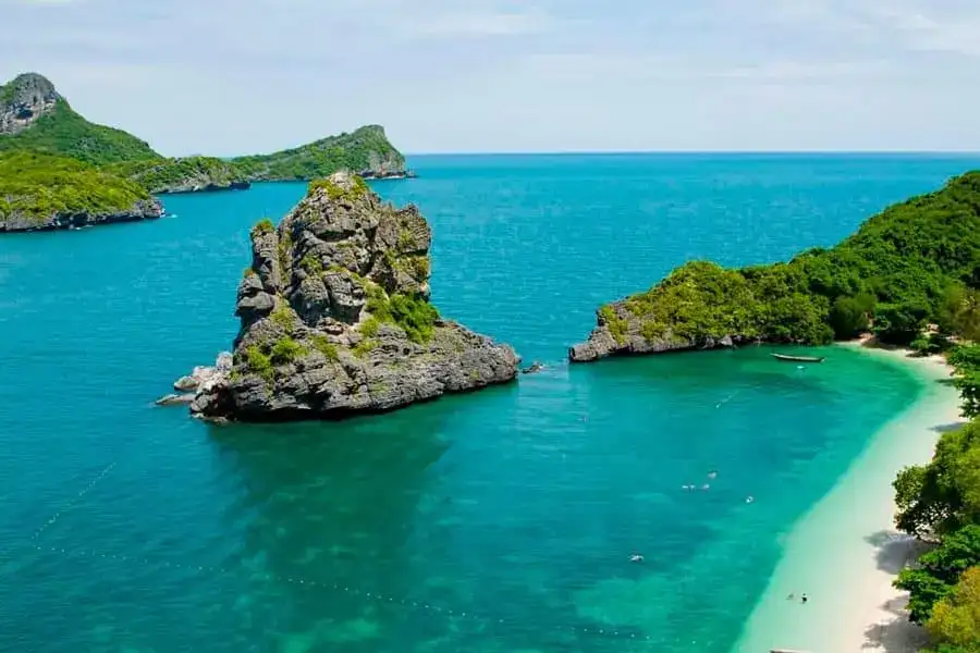 Rock island and beach near Koh Sam Sao
