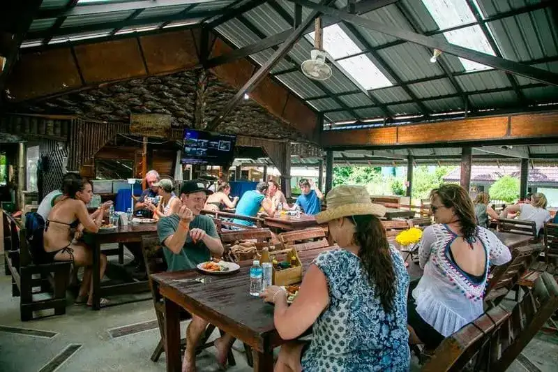 Visitors at lunch in the park restaurant on Wua Ta Lap